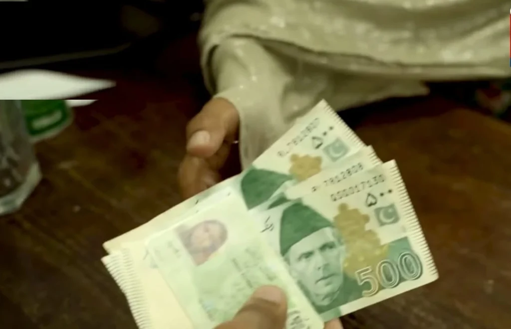 BISP payment 14500 2026 women receiving cash payment Pakistan 8171 Benazir Kafaalat program
